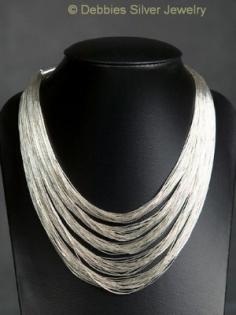 Fließendes Silber Halsketten Silberarmbänder Silber Anhänger